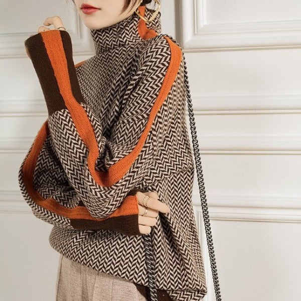 Vista frontal del suéter Nora de punto jaspeado con cuello alto